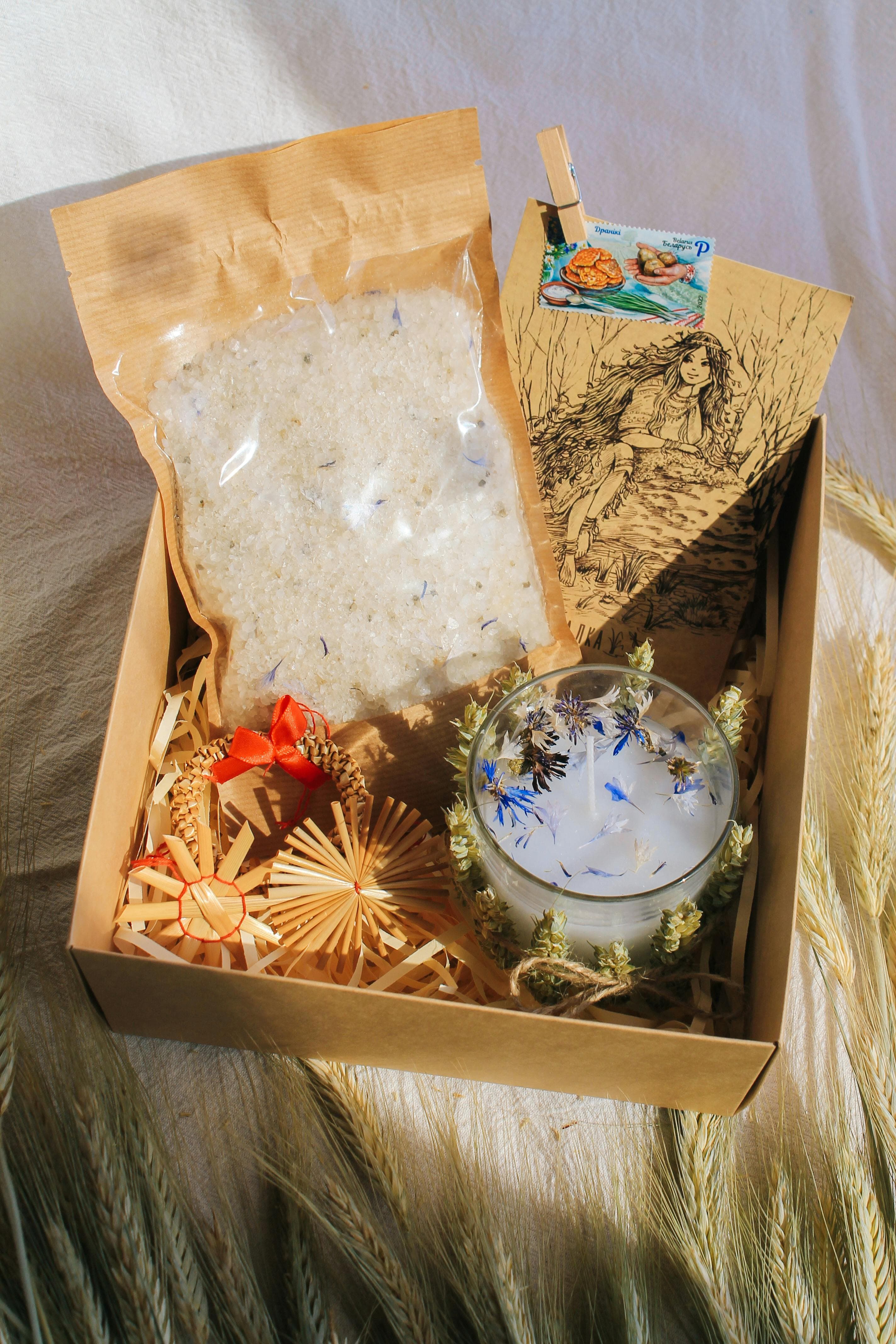 Vintage-style gift box with handmade rustic decorations and natural elements.